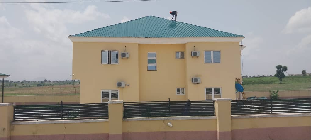 Completed residential building with metal roof